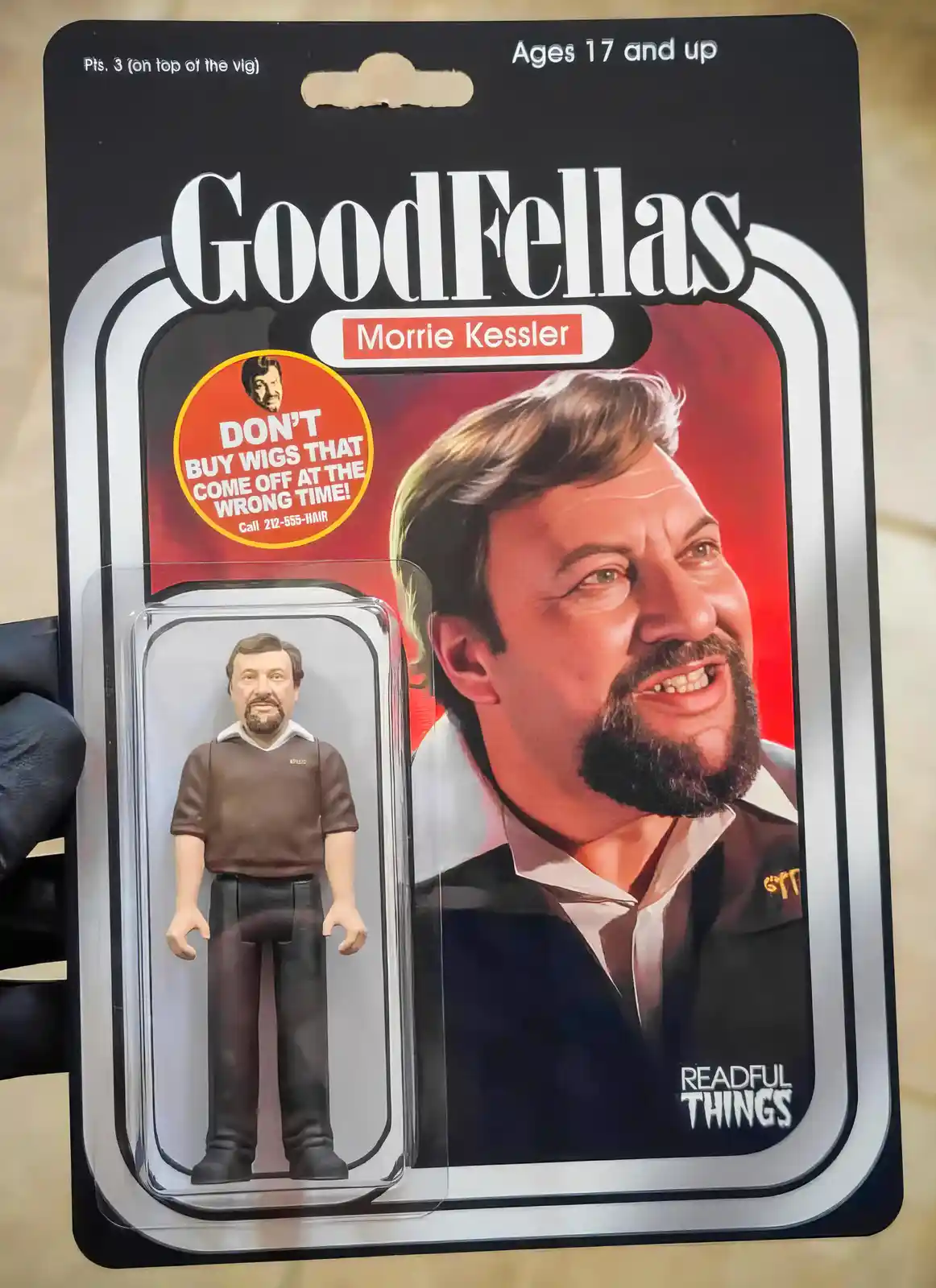 A toy package styled like a Star Wars action figure, featuring a 'GoodFellas' character named Morrie Kessler. The packaging…