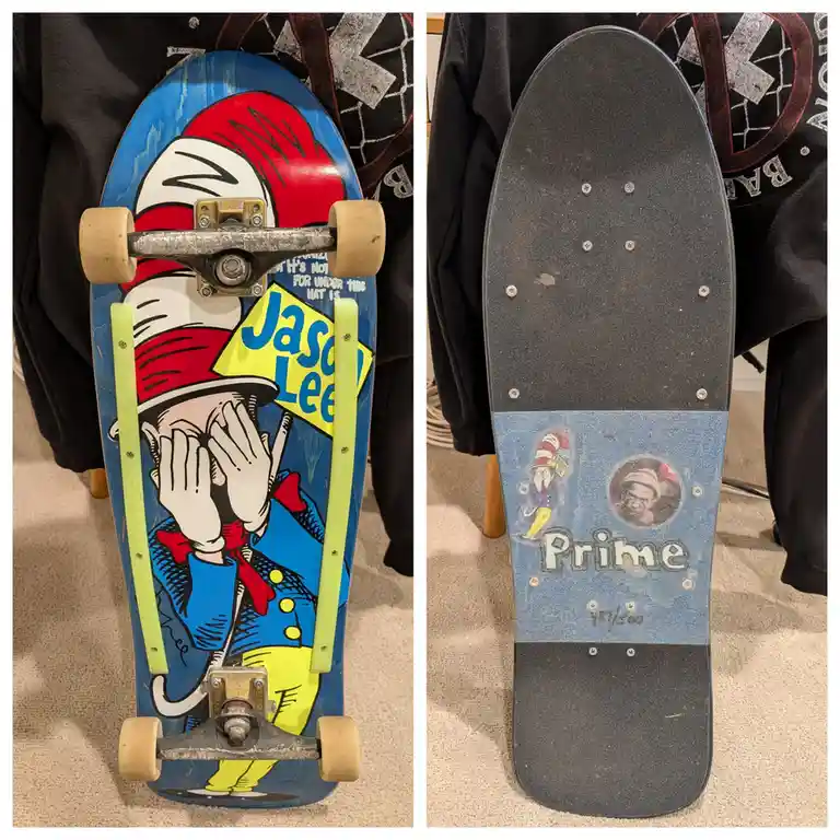 A split-image shows a skateboard deck with the Cat in the Hat character on the top, holding a sign that reads 'Jason Lee'…
