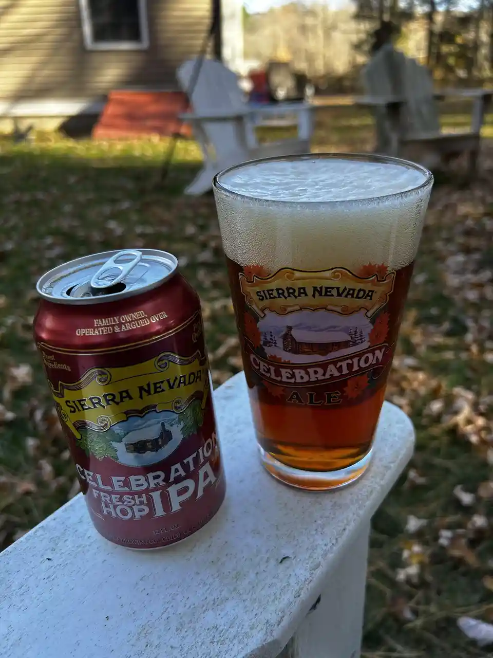 A red can of Sierra Nevada Celebration Fresh Hop IPA sits next to a pint glass of Sierra Nevada Celebration Ale, both…