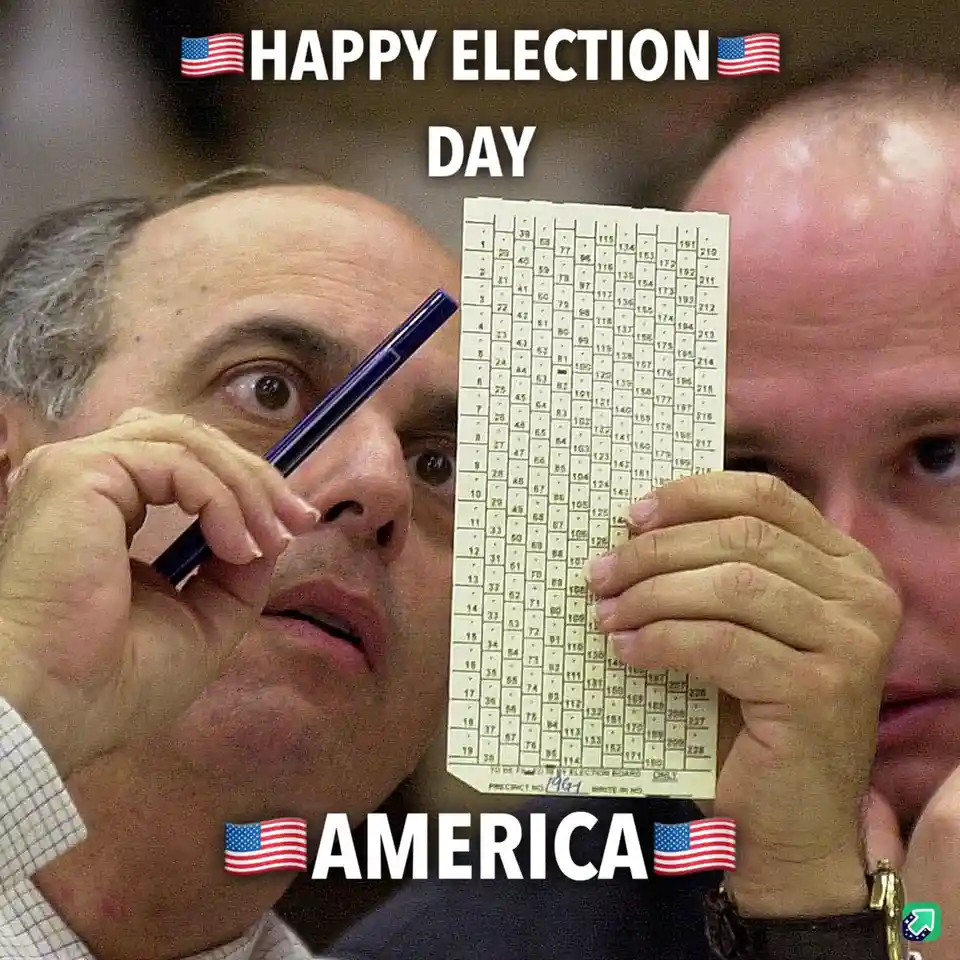A man with wide eyes holds a pen to his temple while another man holds up a ballot with punched holes. The image is overlaid…