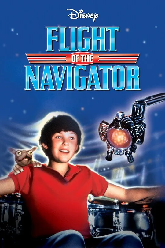 A movie poster for Disney's 'Flight of the Navigator' shows a young boy in a red shirt smiling, with a small alien creature…