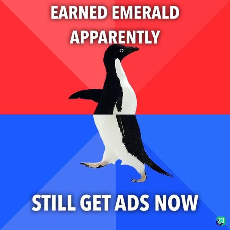 A penguin stands centered against a red and blue background, with white text above reading 'EARNED EMERALD APPARENTLY' and…