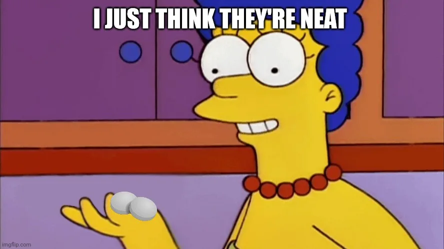 Marge Simpson holds two white pills in her hand, smiling innocently while looking off to the side. The overlaid text reads…