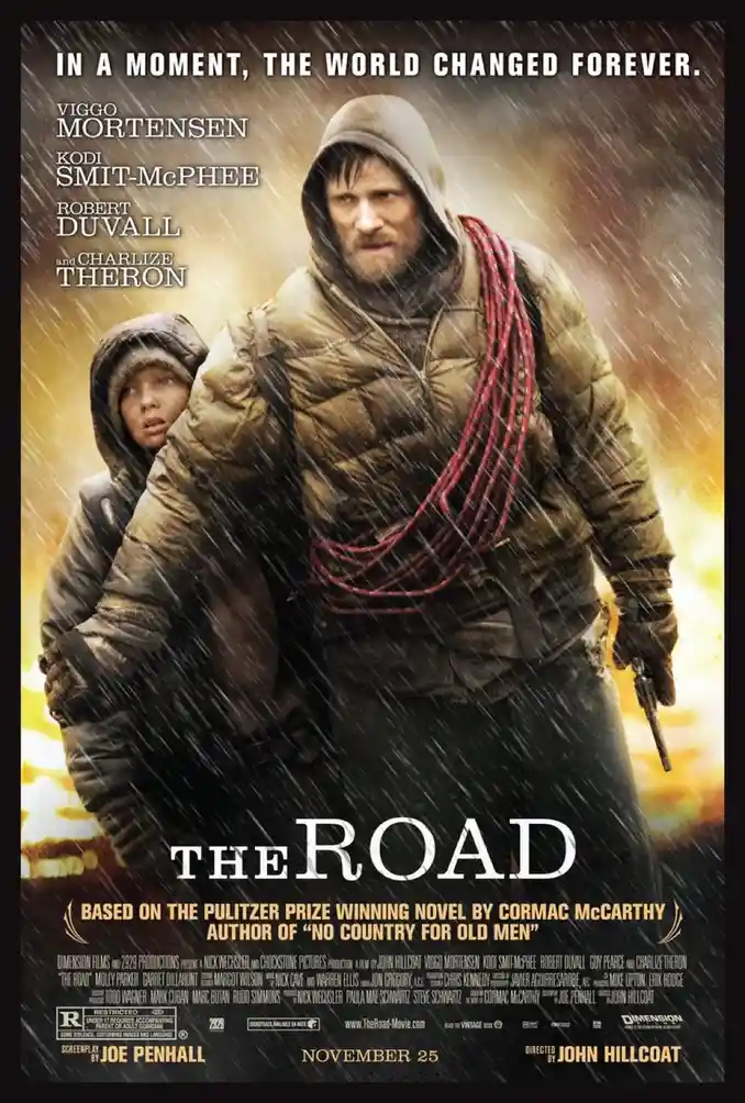 A movie poster for 'The Road' shows a man in a hooded jacket holding a child in a rainstorm, with a gun in his other hand…