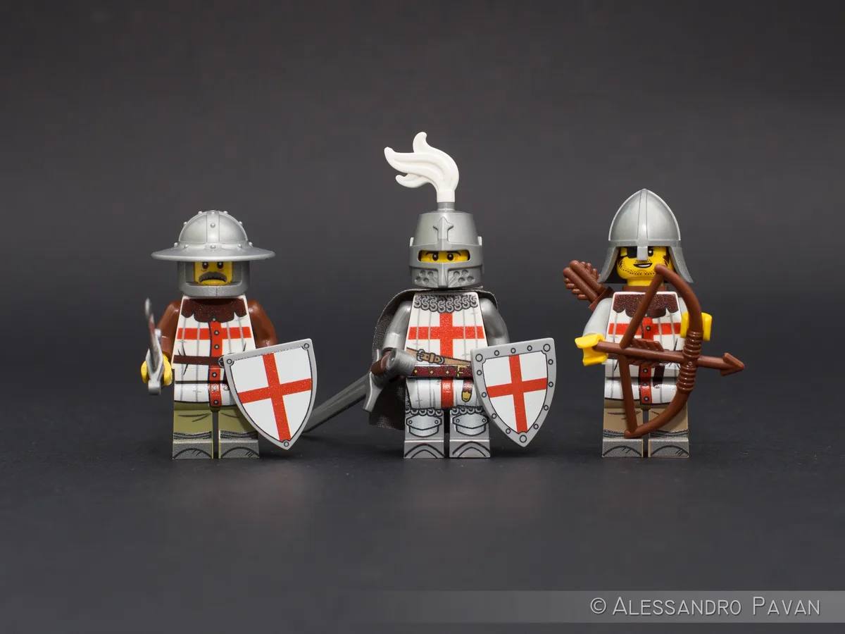Three Lego knight minifigures stand side-by-side against a dark gray background. The figure on the left wears a helmet with…