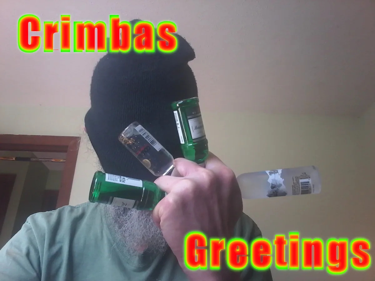A person with a long white beard and black beanie holds multiple empty liquor bottles in their hands, obscuring their face…