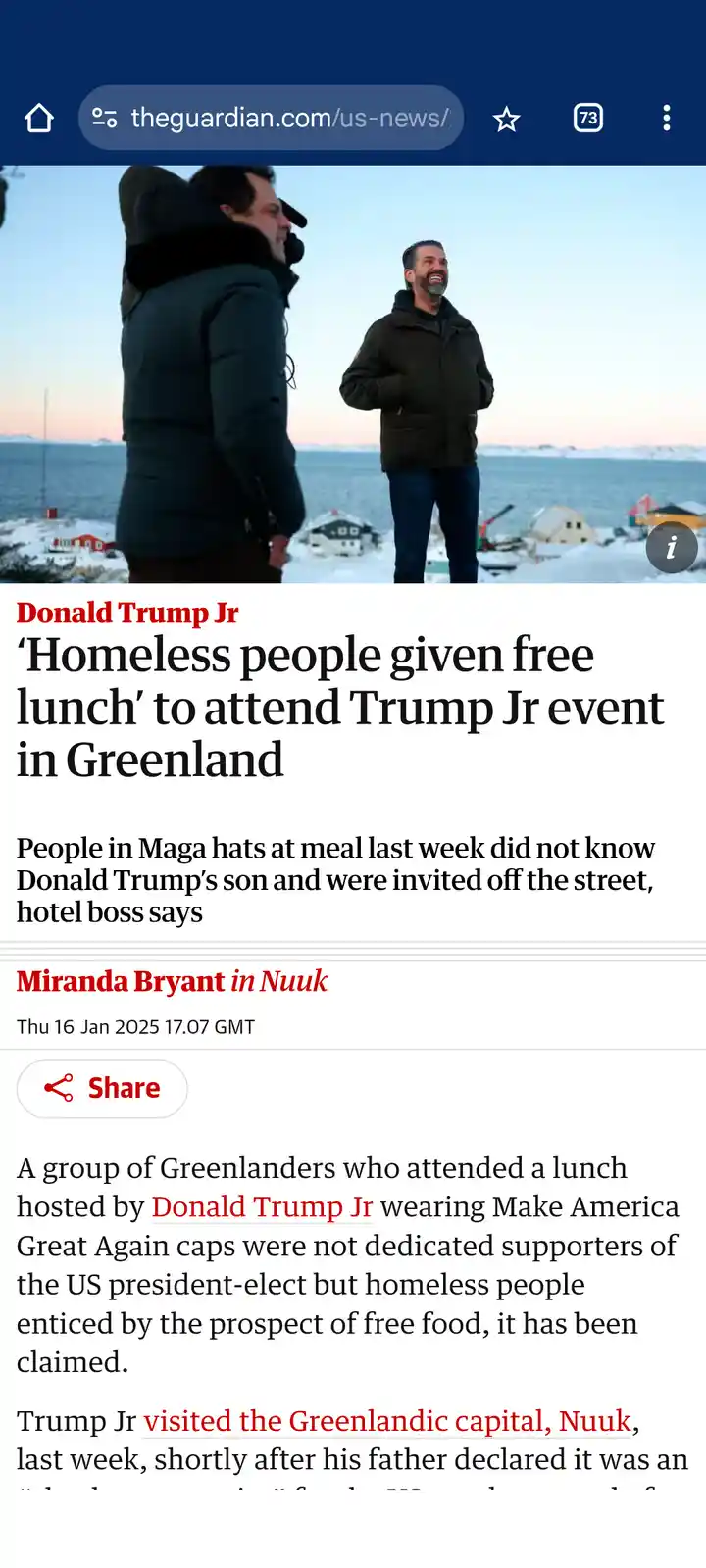 A screenshot of a Guardian news article shows two men in winter coats standing outdoors in a snowy, coastal town. The…