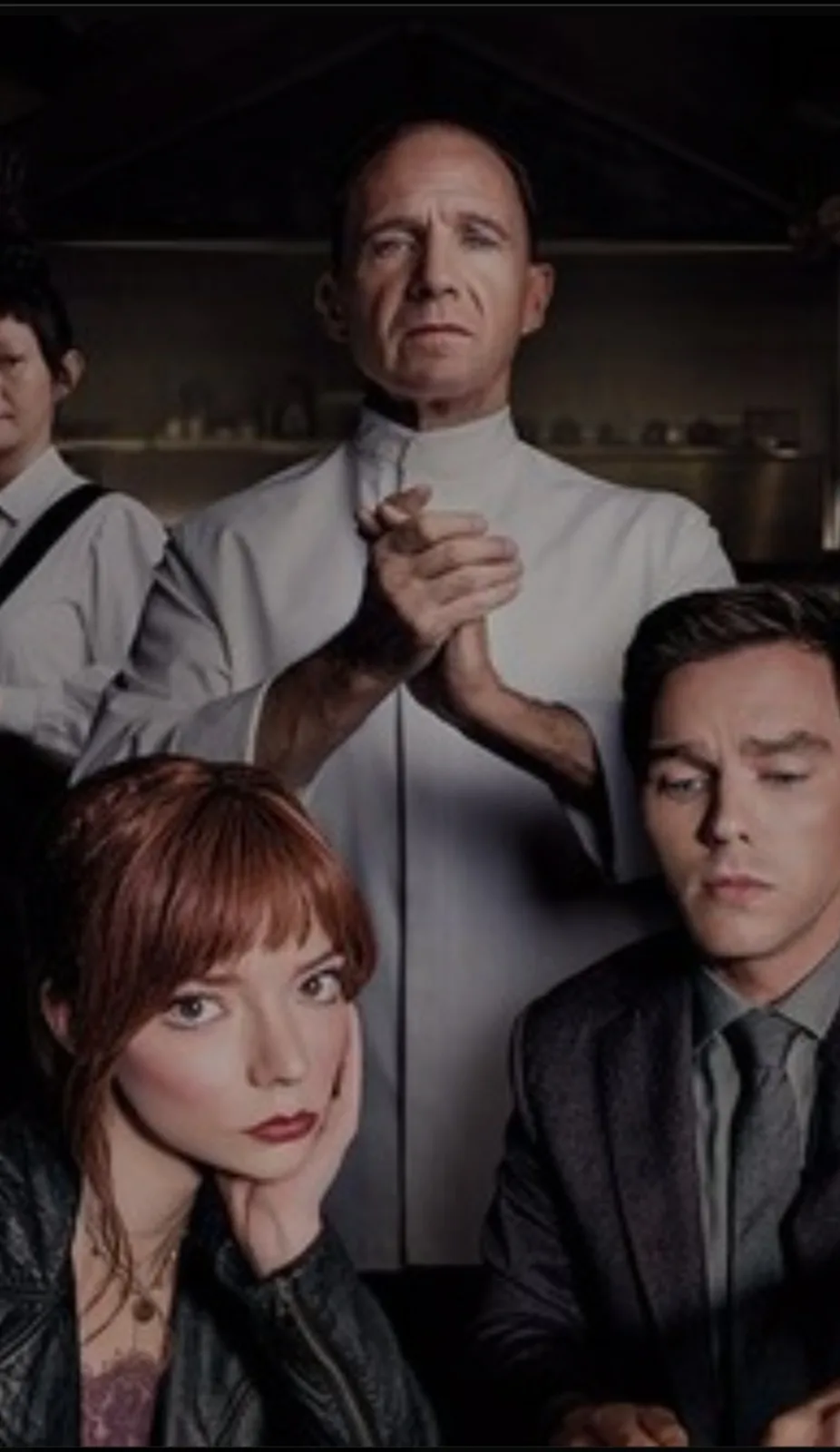 A still from the TV show 'The Leftovers' shows four characters with serious, disapproving expressions. The central figure, a…