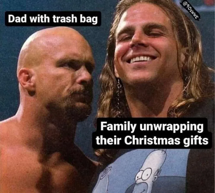 The image shows two men, one bald and serious on the left, and one with long hair smiling broadly on the right. The bald man…