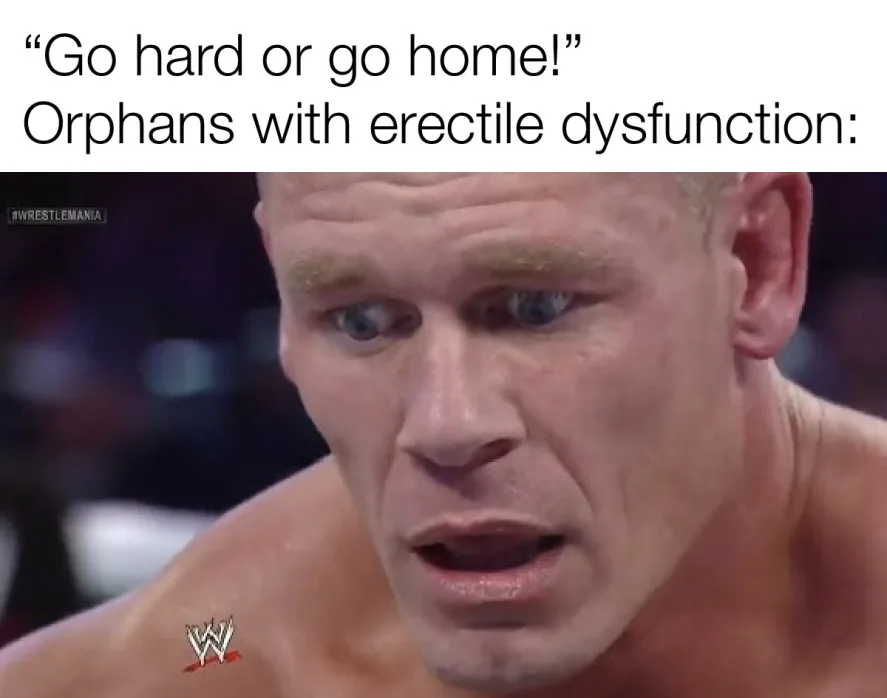 A close-up image of wrestler John Cena with a shocked, wide-eyed expression, mouth slightly open, looking upward. The image…