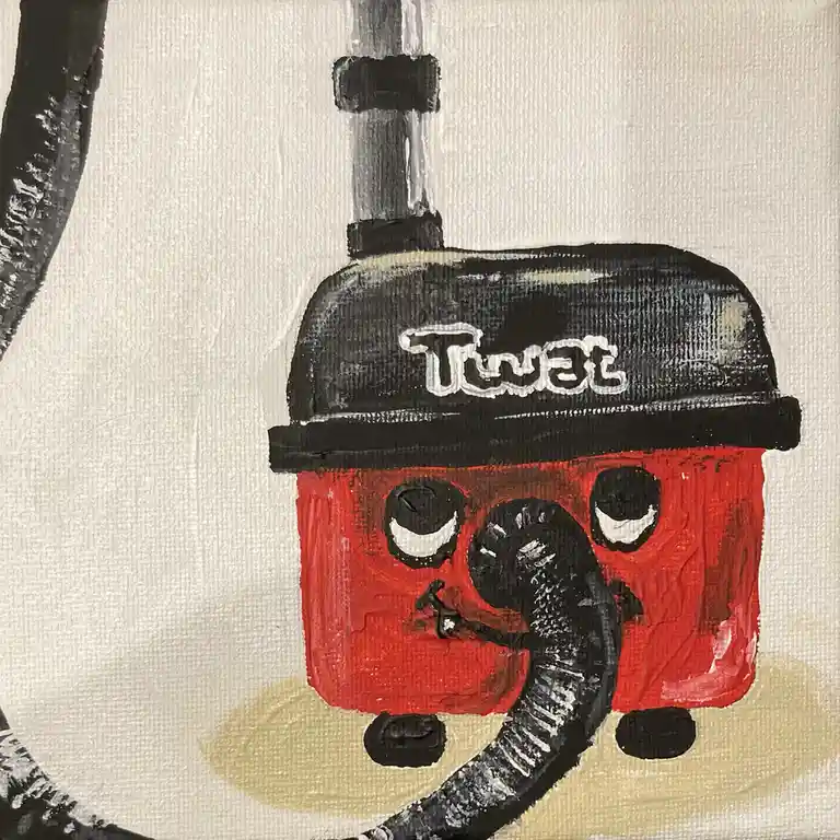 A hand-painted, cartoonish red vacuum cleaner with a black top and hose, featuring large, expressive eyes and a small mouth…
