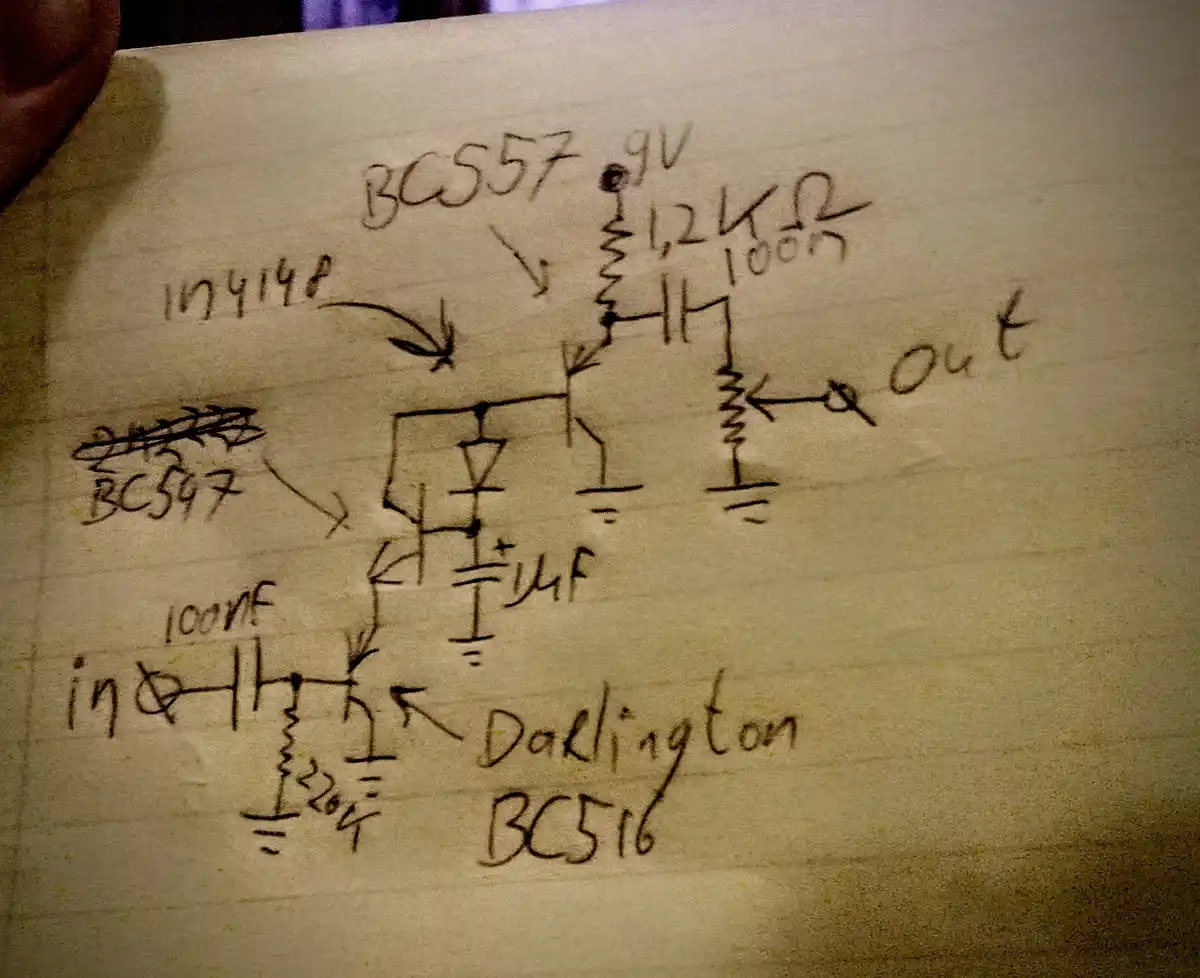 A hand-drawn schematic on lined paper shows a transistor circuit with components labeled BC557, BC597 (crossed out), BC516…