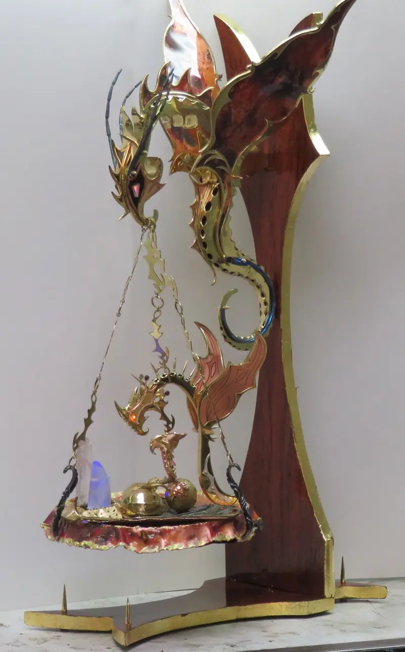A Majestic Dragon Sculpture Nestled with Its Baby and Eggs