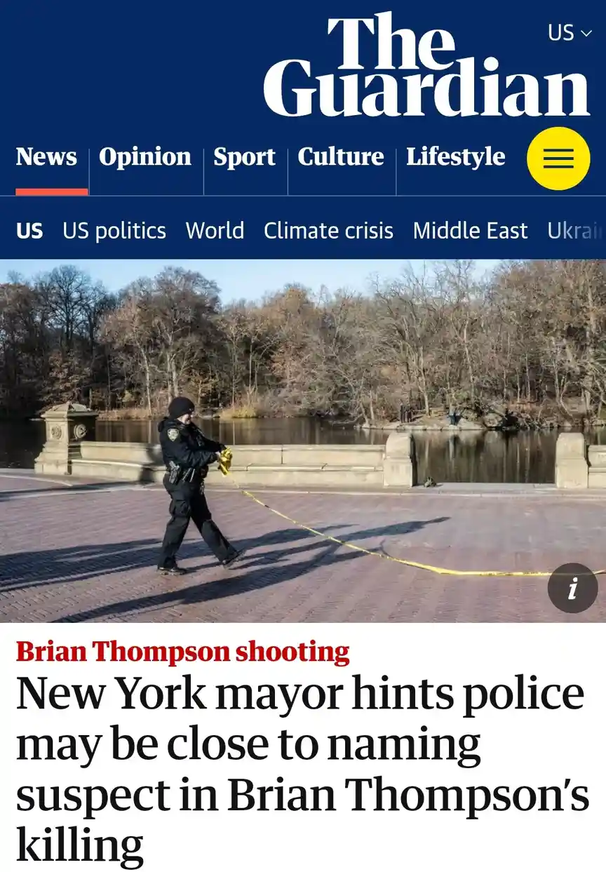 The image shows the top of The Guardian news website with a photo of a police officer laying yellow crime scene tape near a…