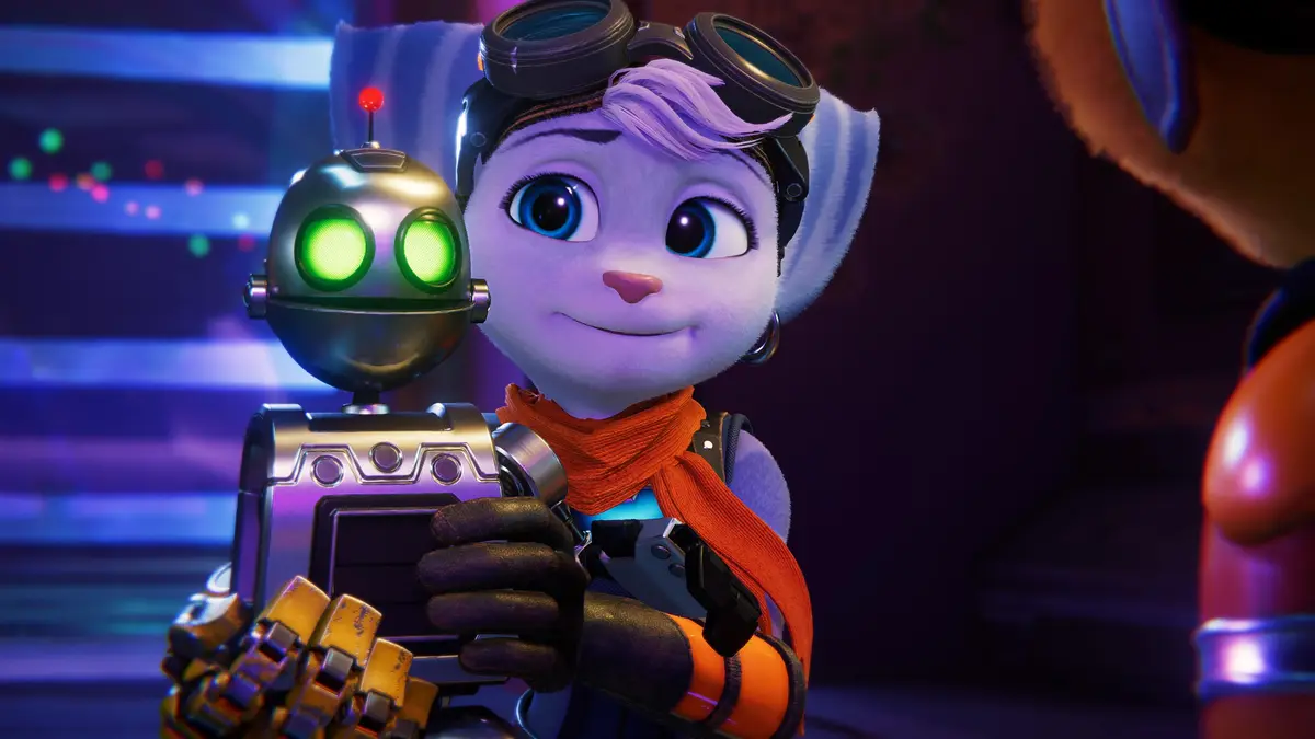 A purple-furred animated character with goggles and an orange scarf holds a small robot with glowing green eyes and a red…