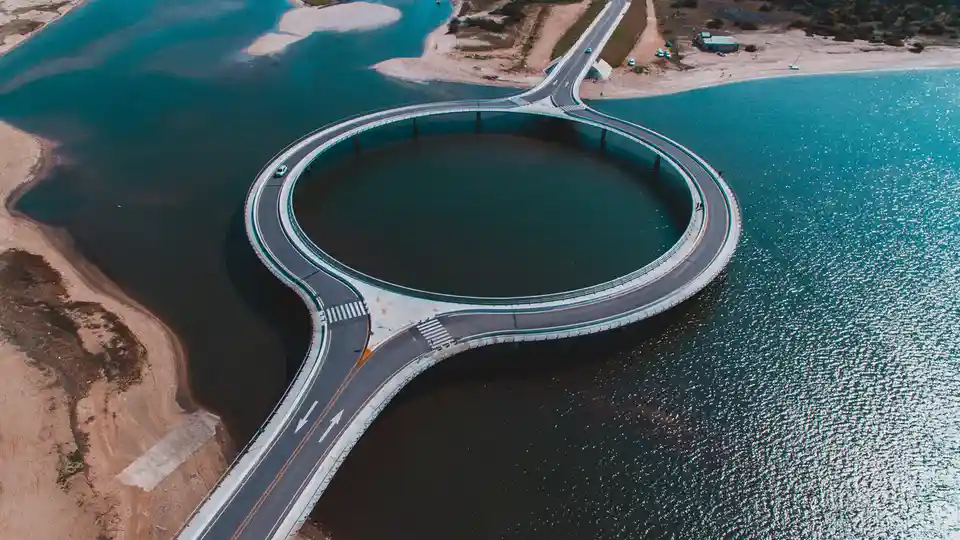 Rafael ViÃÂ±oly, a renowned Uruguayan architect, designed the Laguna GarzÃÂ³n Bridge, featuring two semicircular sections…