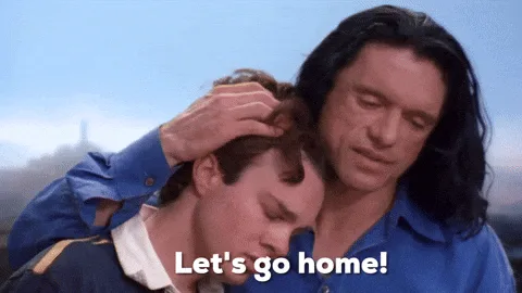 Six panels show a man with long dark hair in a blue shirt holding another man's head gently while repeating the phrase…