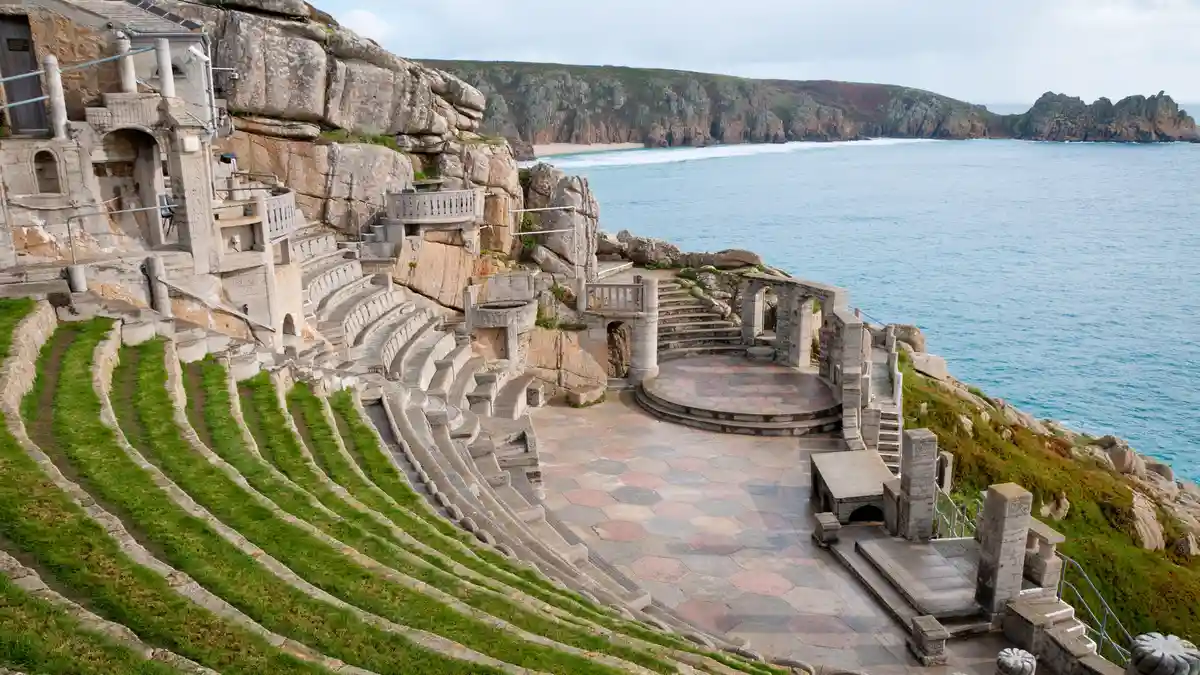 The Minack Theatre, set against the crashing waves of the English Channel in Cornwall, hosts up to 80,000 visitors annually…
