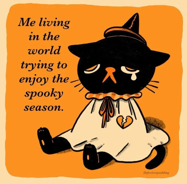 A black cartoon cat wearing a witch hat and a white dress with a broken heart on it sits sadly with a tear falling from its…