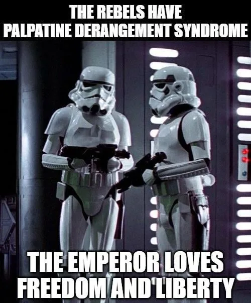 Two stormtroopers stand facing each other in a dimly lit corridor with vertical light panels on the wall behind them. The…
