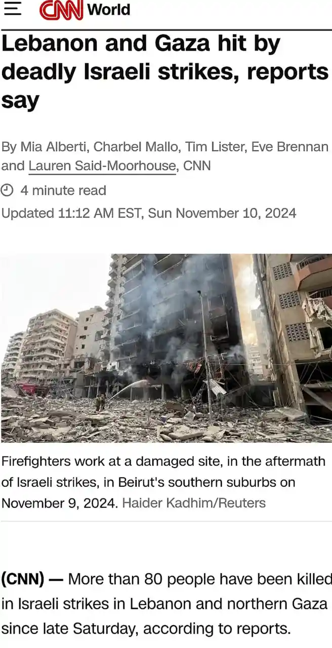 A screenshot of a CNN World news article from November 10, 2024, showing a photo of firefighters working amidst rubble and…