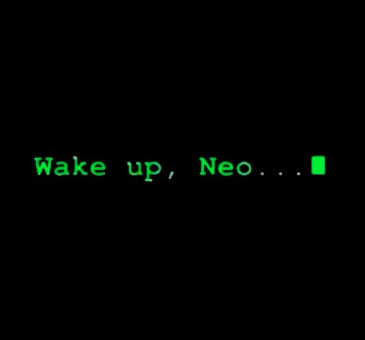 A black background displays glowing green text that reads 'Wake up, Neo...' followed by three dots and a blinking cursor…