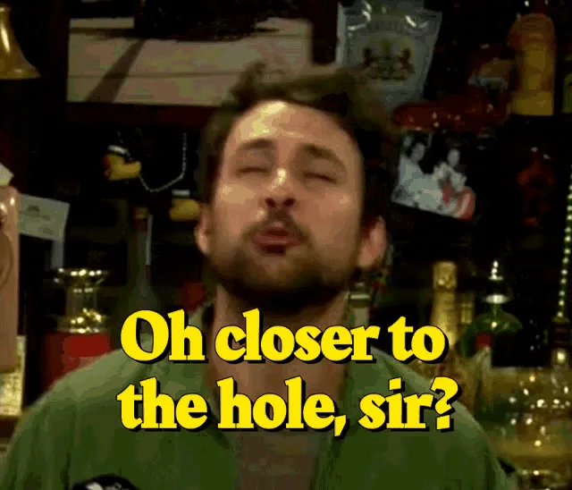 The image shows six panels of actor Charlie Day in a green military-style uniform, set against a bar background with bottles…