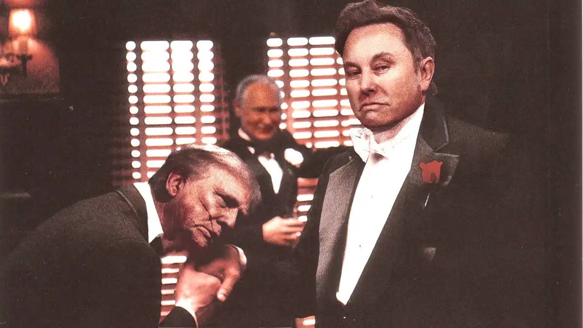 A still from a movie shows three men in tuxedos. In the foreground, a man with a stern expression looks down at another man…
