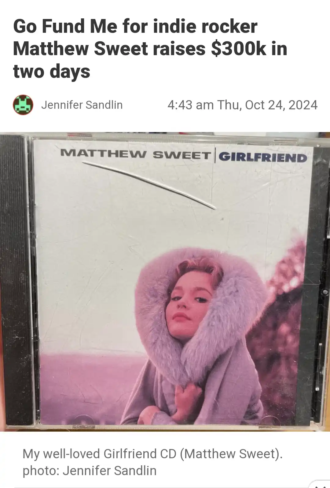 A screenshot of a social media post by Jennifer Sandlin shows a close-up photo of a scratched and worn CD case for Matthew…