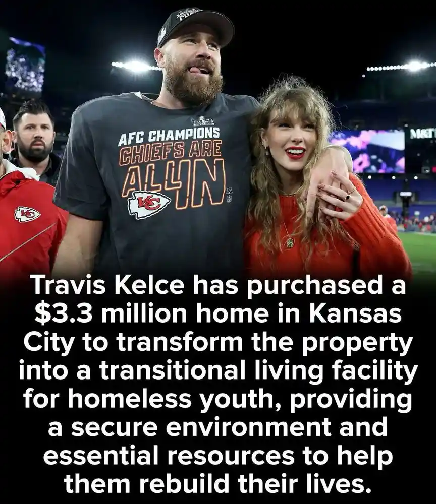 A man with a beard wearing a 'AFC CHAMPIONS CHIEFS ARE ALL IN' t-shirt stands with a smiling woman in an orange sweater at a…