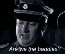 A six-panel image sequence shows a man in a dark uniform and cap, progressively changing his facial expression from confused…