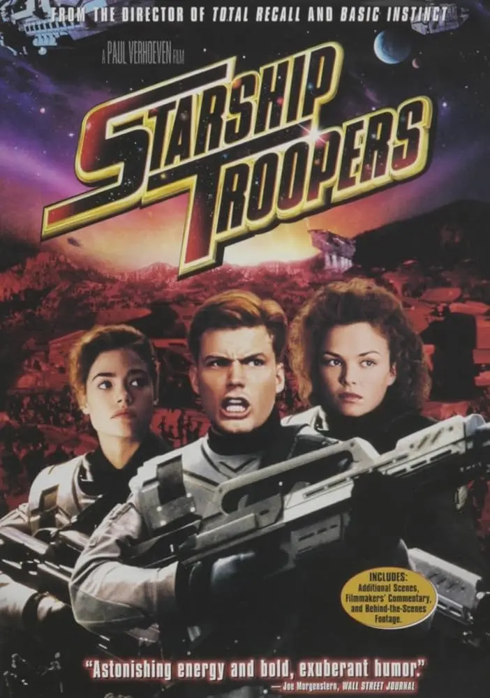 This is a movie poster for 'Starship Troopers' featuring three soldiers in futuristic armor holding weapons, set against a…