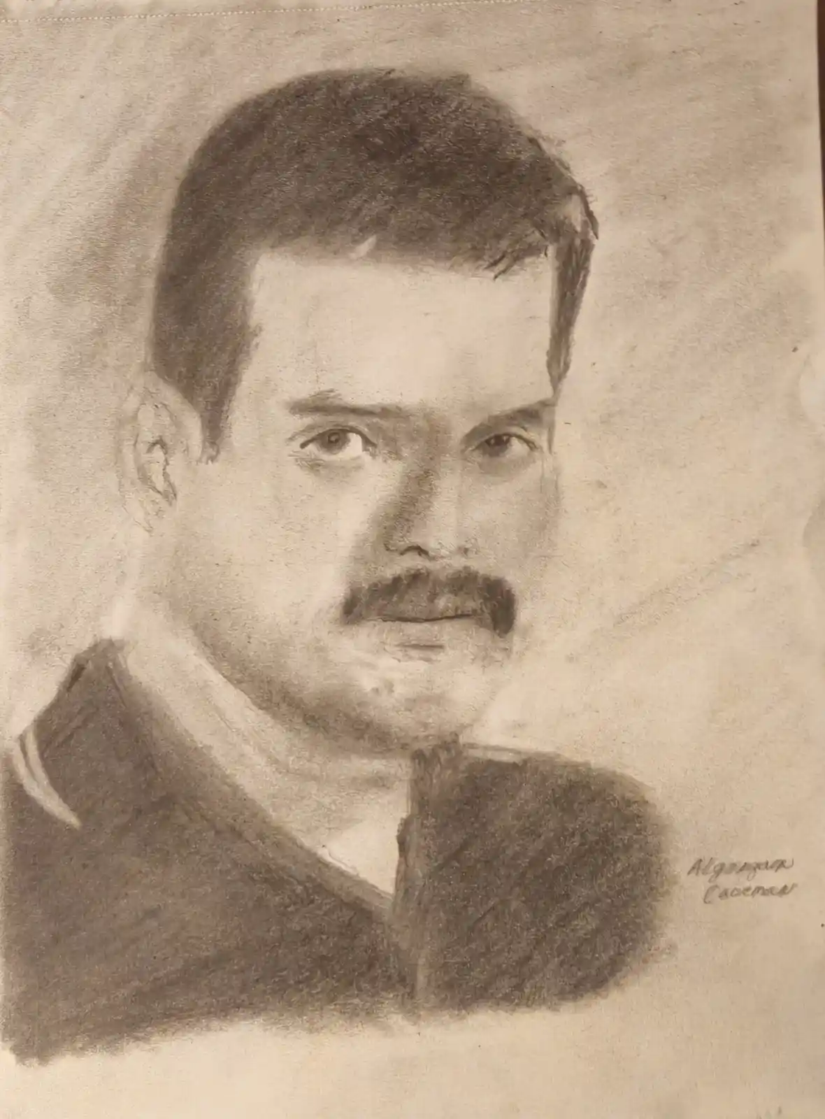 A sepia-toned charcoal portrait of a man with a mustache and short hair, wearing a collared shirt and jacket, with the…
