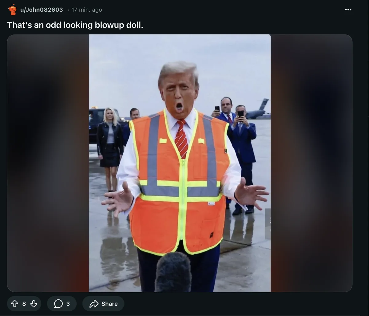 A man with white hair wearing a bright orange safety vest over a white shirt and red tie stands with his mouth open and…