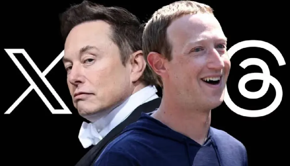 The image shows two men, Elon Musk on the left with a serious expression and Mark Zuckerberg on the right smiling, set…