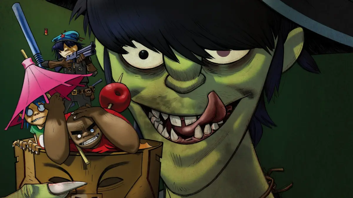 A close-up of a green-skinned, grinning cartoon character with black hair and a hat, holding a red apple. Behind him, three…