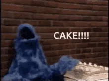 A blue, furry monster with a wide-open mouth and expressive hands is shown in six frames, repeatedly shouting "CAKE!!!!"…