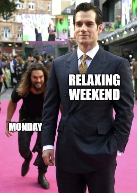 A man in a dark suit and tie stands confidently on a pink carpet with the text 'RELAXING WEEKEND' overlaid on his chest…