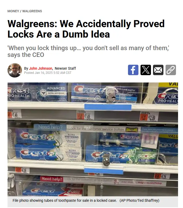 A Walgreens store shelf displays multiple rows of Crest toothpaste tubes, each row secured inside a locked metal case with…