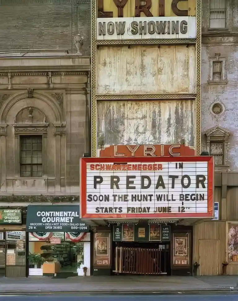 A vintage photo of the Lyric Theatre's marquee advertising Arnold Schwarzenegger in 'Predator' with the tagline 'Soon the…