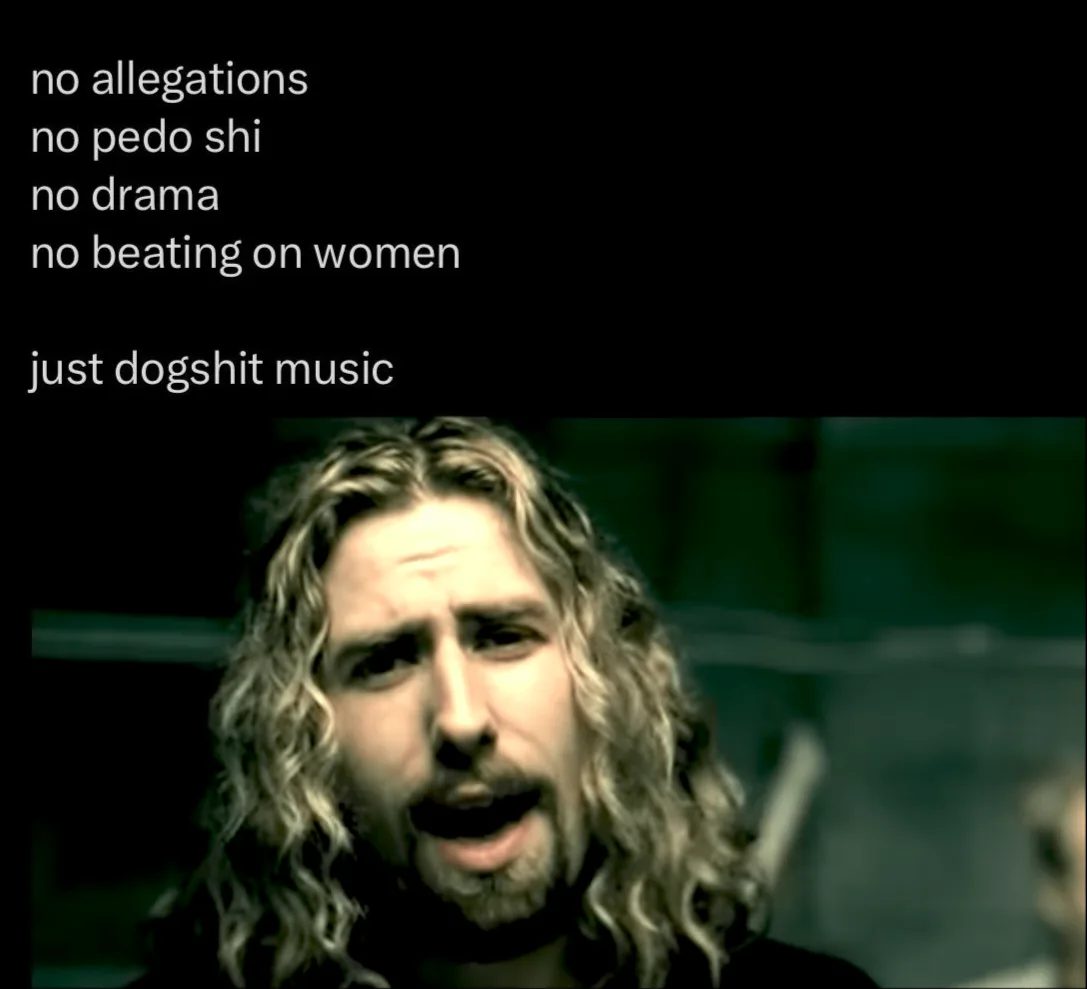 A man with long curly hair and a beard looks distressed while white text lists negative claims about him, ending with 'just…