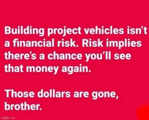 A solid red background with white text in two paragraphs. The top paragraph reads 'Building project vehicles isn't a…
