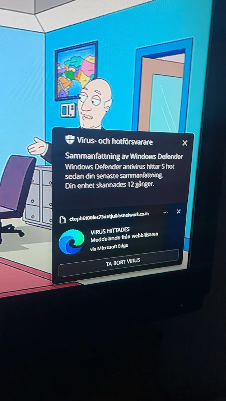 A screenshot of a Windows Defender security alert in Swedish, overlaid on a cartoon office scene featuring a bald man in a…