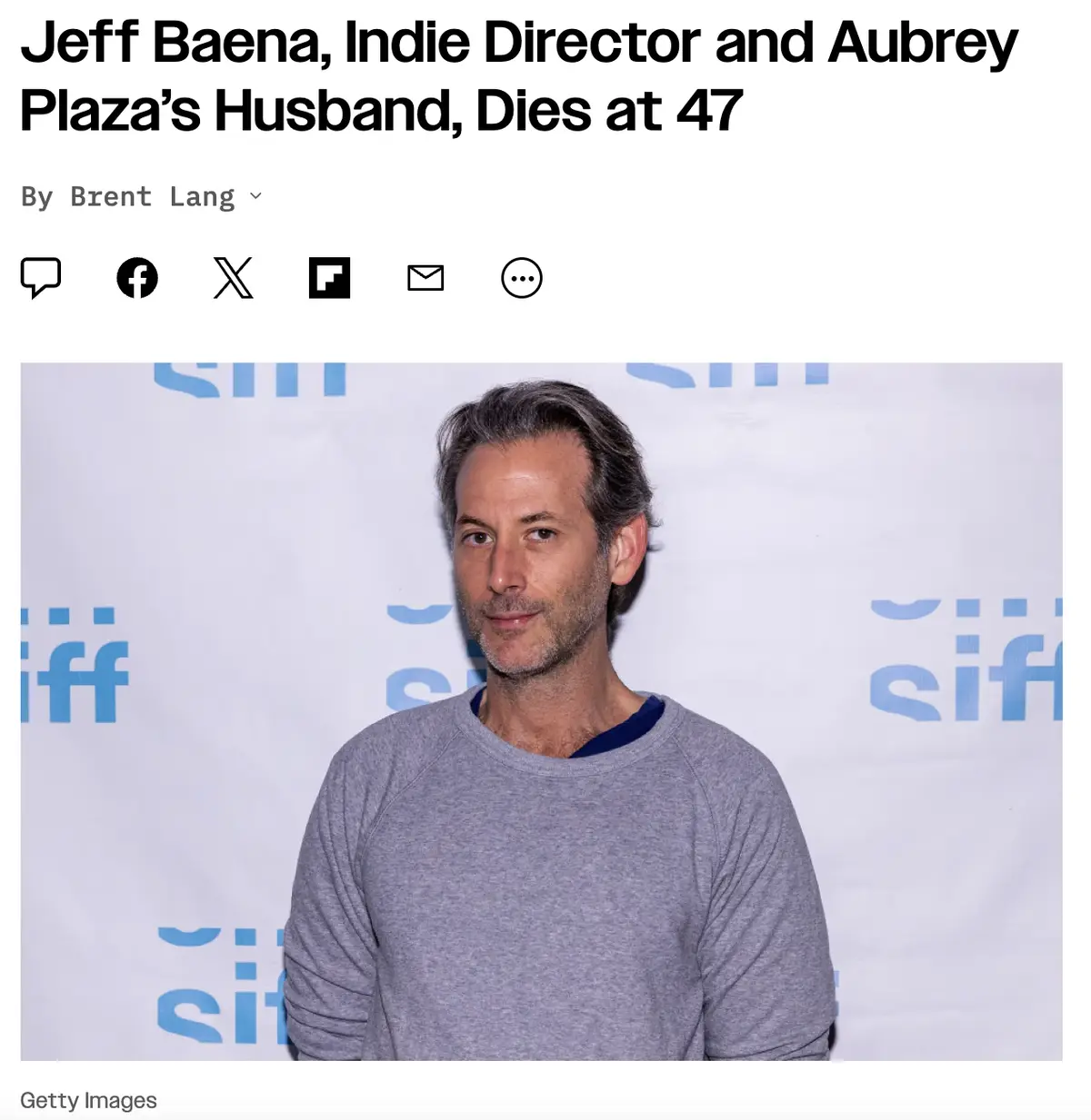 A screenshot of a news article header showing a photo of Jeff Baena, a man with graying hair and a light beard wearing a…