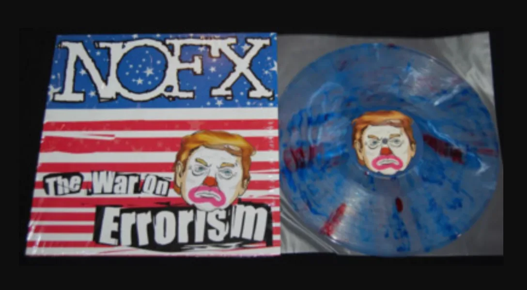 An album cover and vinyl record for the band NOFX, both featuring a cartoon caricature of Donald Trump with a clown nose and…