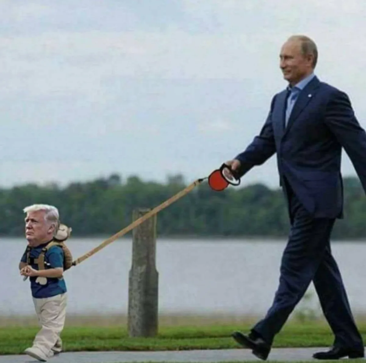 A man in a dark suit walks confidently on a path near water, holding a leash attached to a tiny, digitally altered figure of…