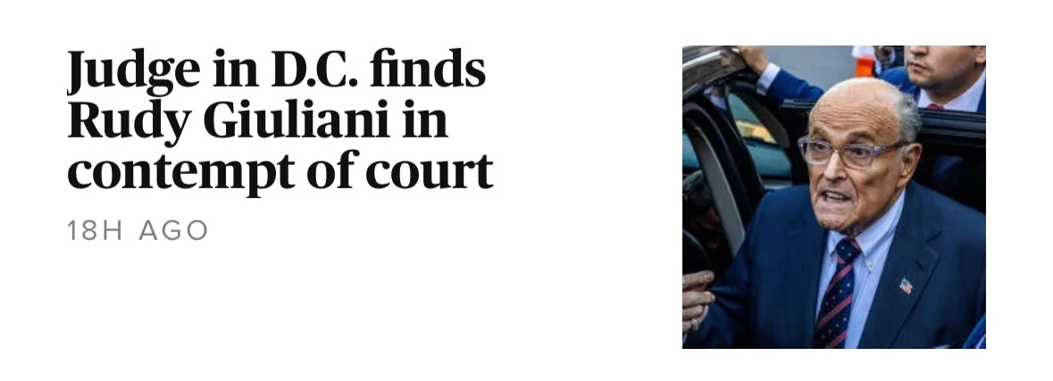 A news headline reads 'Judge in D.C. finds Rudy Giuliani in contempt of court' next to a photo of Rudy Giuliani exiting a…