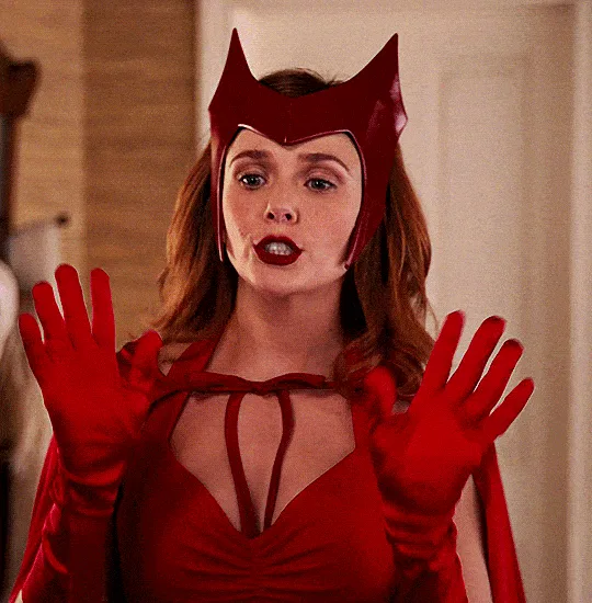 A six-panel image collage shows actress Elizabeth Olsen as the character Wanda Maximoff (Scarlet Witch) from the Marvel…