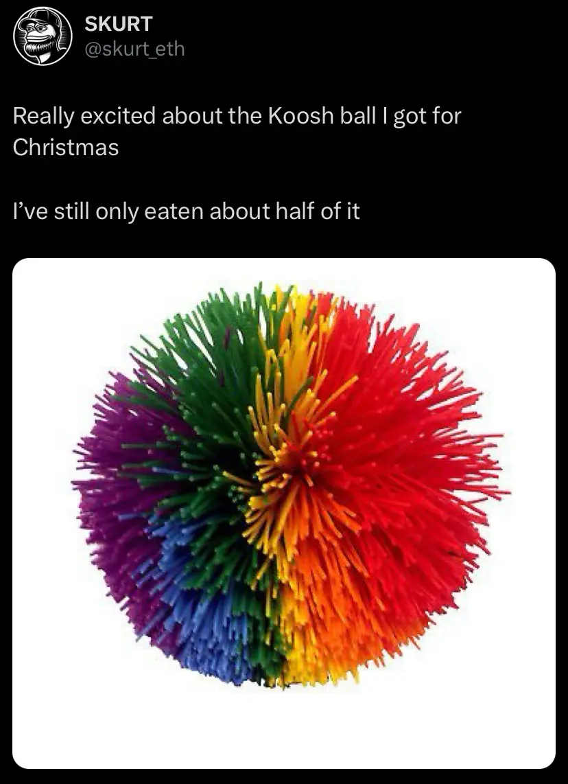 A rainbow-colored Koosh ball toy with spiky bristles is shown against a white background. Overlaid text reads: 'Really…