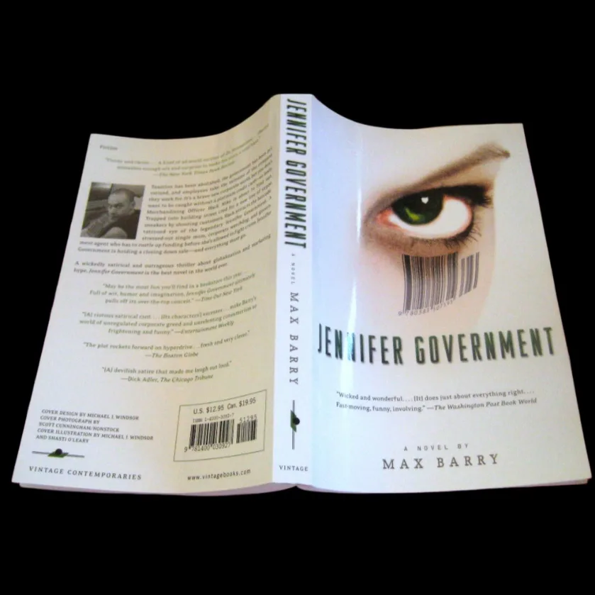 The back cover of the book 'Jennifer Government' by Max Barry is shown open, revealing the front cover with a barcode and…